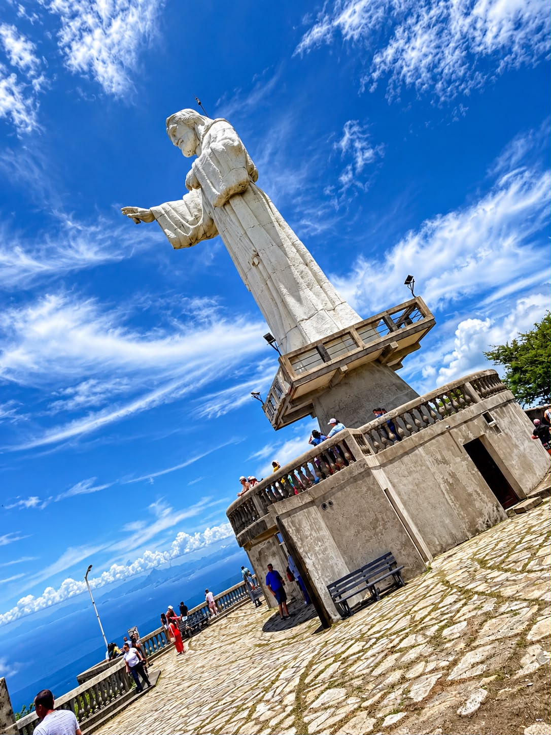 Monument overlooking the Pacific coast under a bright blue sky